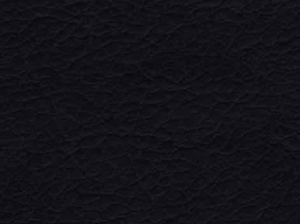 Microfiber leather. Почти не царапается.