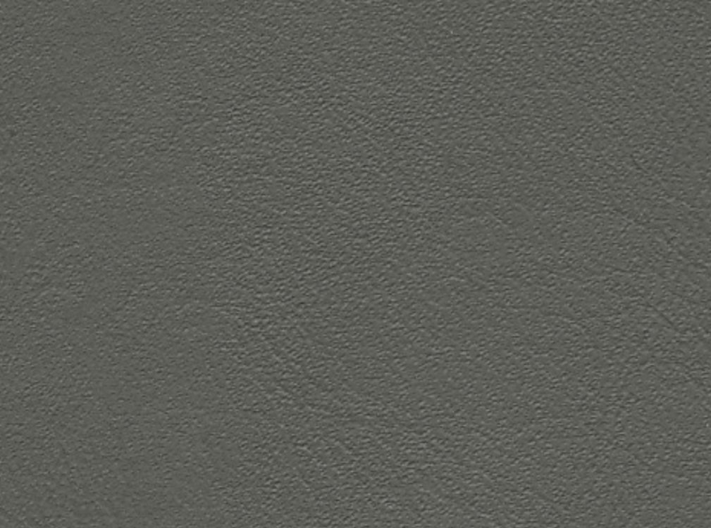 Microfiber leather. Почти не царапается.
